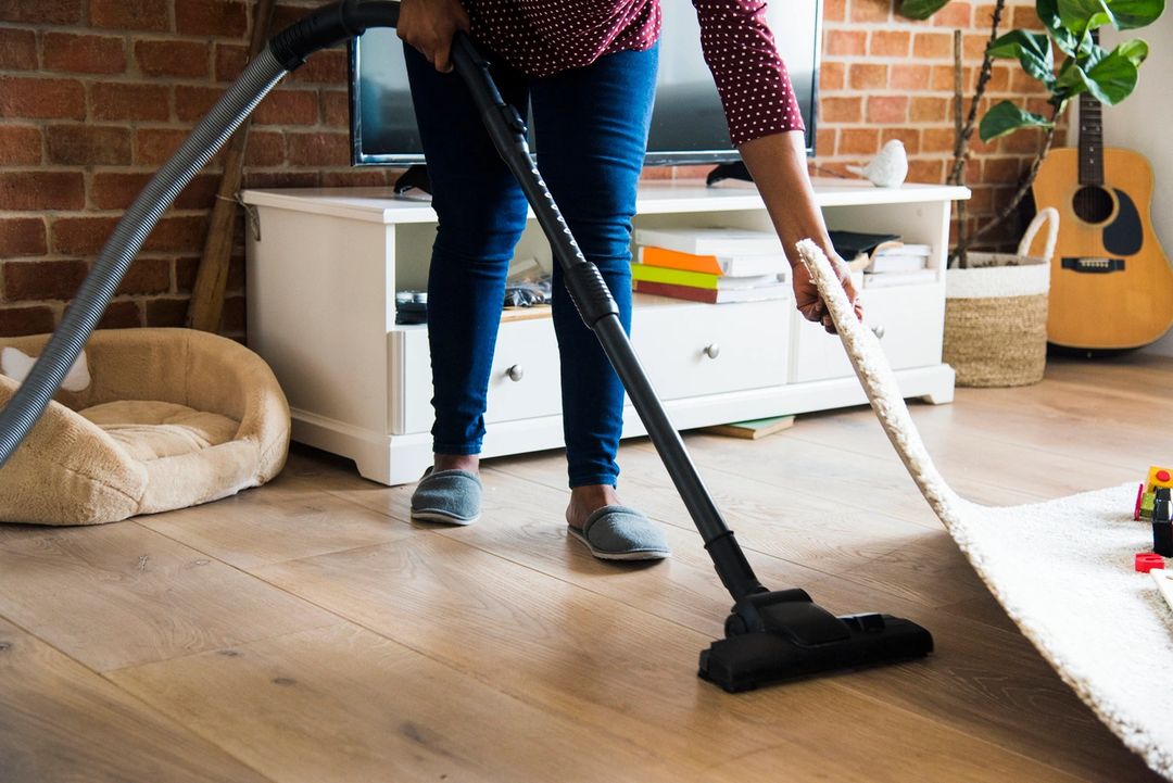 Woman is Cleaning Room